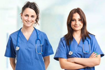 two female nurse are smiling